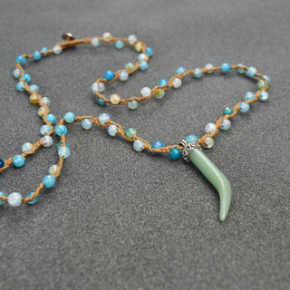 Beaded long necklace with a jade horn, Jade necklace, hand-crafted necklace, jade horn, loop closure, overhead design
